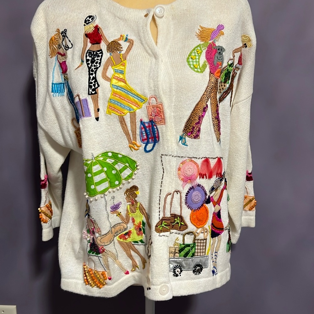 XL Design Option button down sweater.
2004 Limited Edition,
Girls Day Out